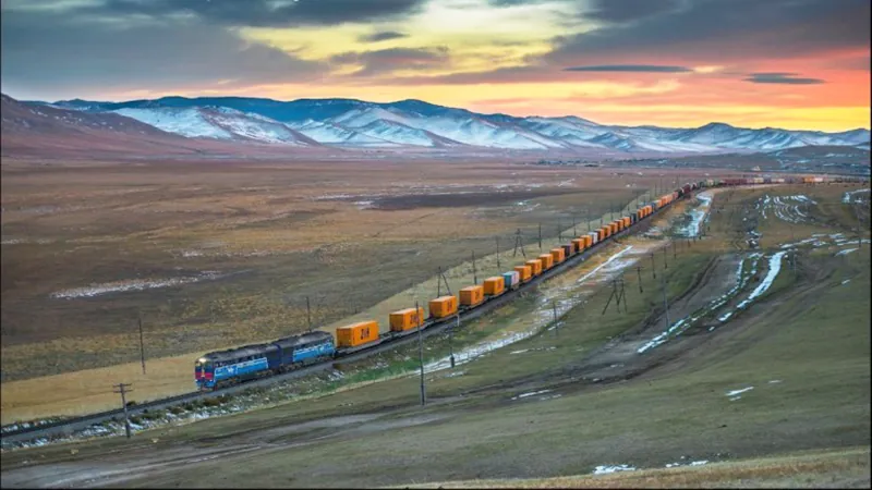 Freight train crossing the steppe on the New Silk Road
